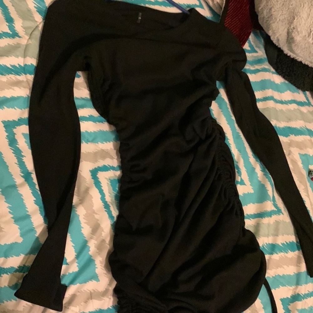 A black long sleeve backless